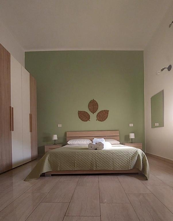 Postel nebo postele na pokoji v ubytování Lecce d'amare - 3 rooms