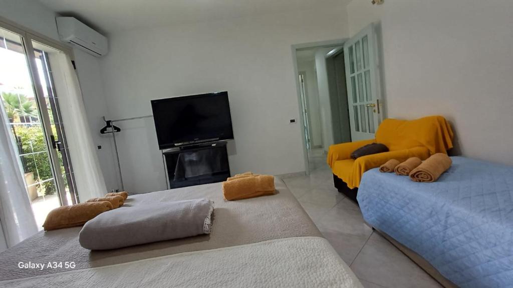 TV a/nebo společenská místnost v ubytování Casa Vacanze AML