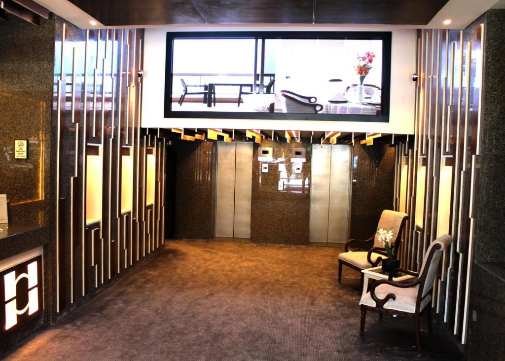 TV a/nebo společenská místnost v ubytování Hotel Méditerranée Beyrouth