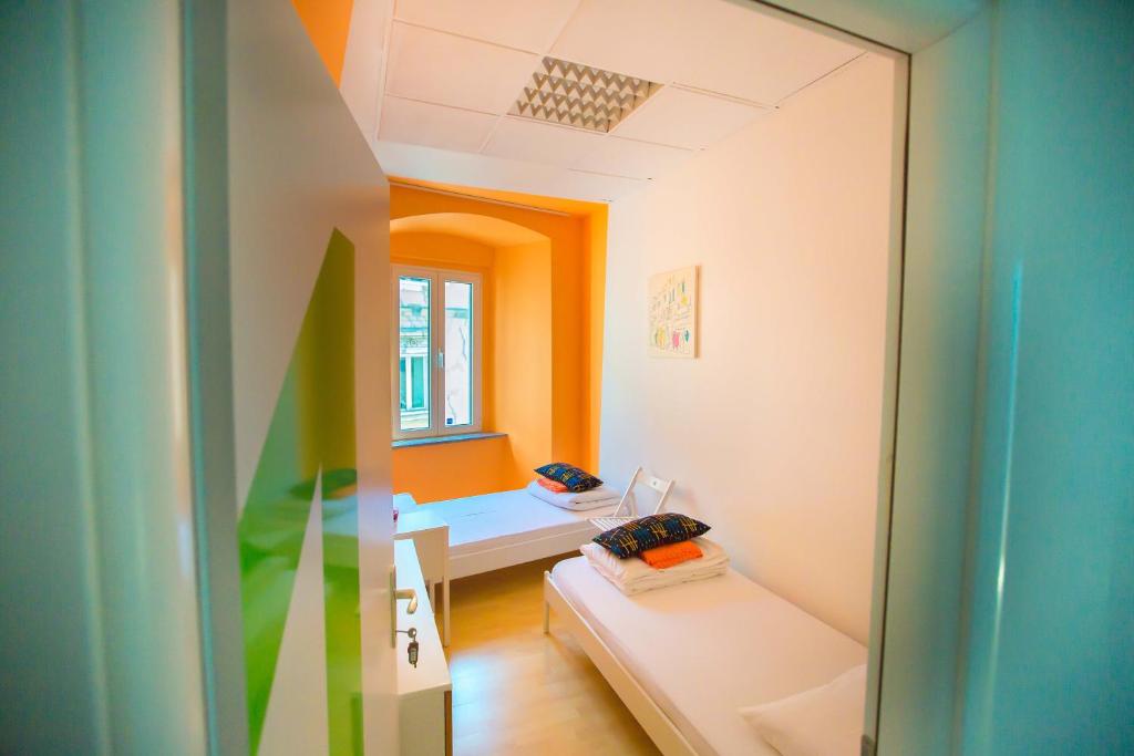 Posteľ alebo postele v izbe v ubytovaní Hostel Kosy