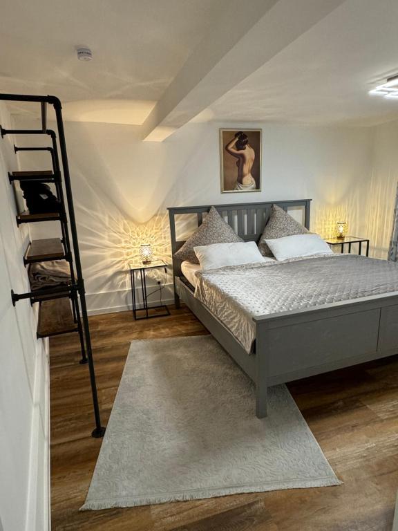 Postel nebo postele na pokoji v ubytování Stadtzauber Apartments