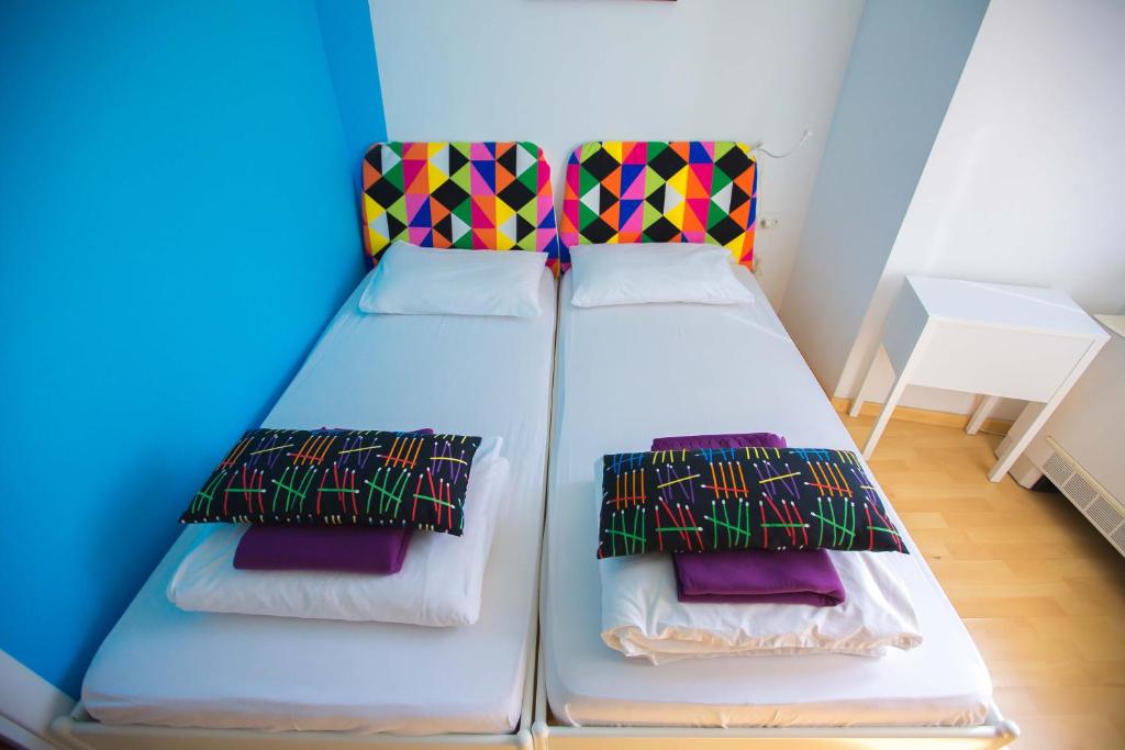 Posteľ alebo postele v izbe v ubytovaní Hostel Kosy