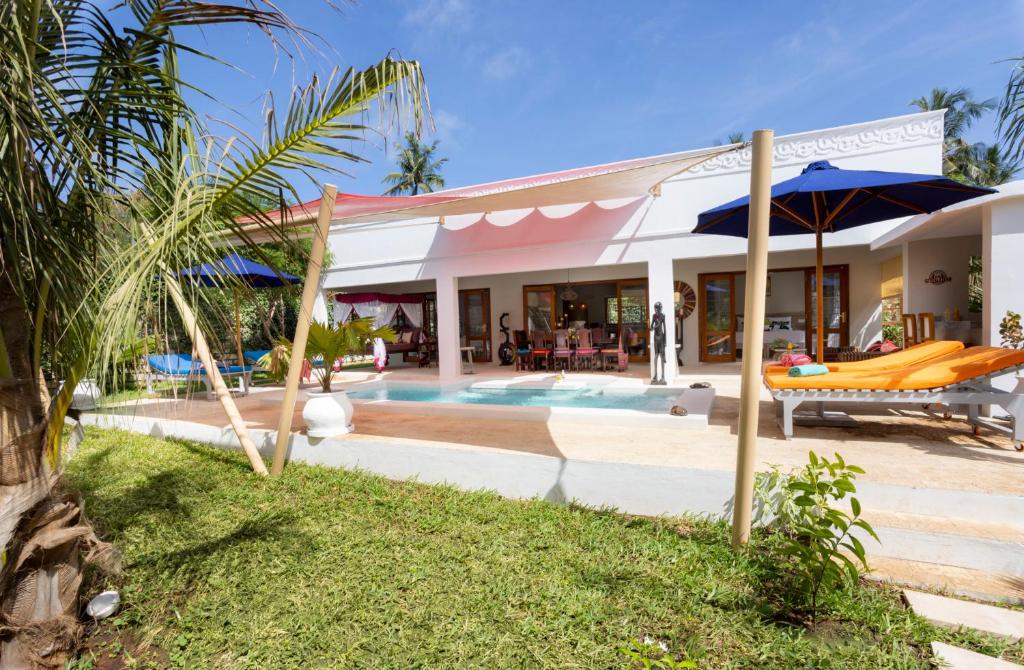 Swimmingpoolen hos eller tæt på Kasa Tatu Cottages