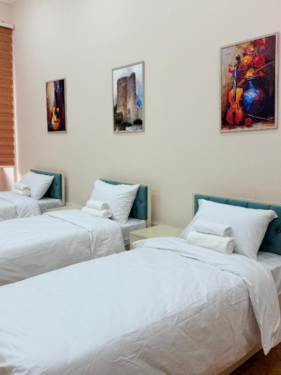 Postel nebo postele na pokoji v ubytování ALARA Inn HOSTEL & HOTEL