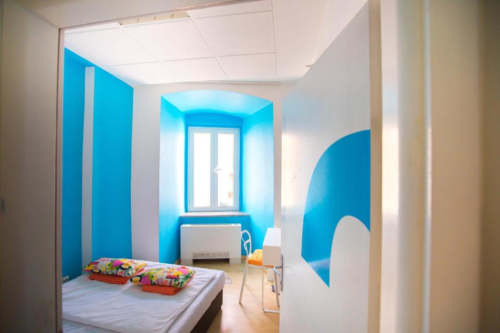 Posteľ alebo postele v izbe v ubytovaní Hostel Kosy