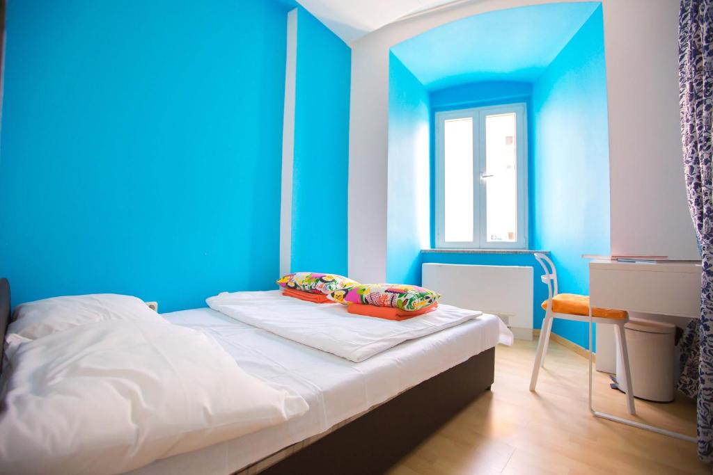 Posteľ alebo postele v izbe v ubytovaní Hostel Kosy