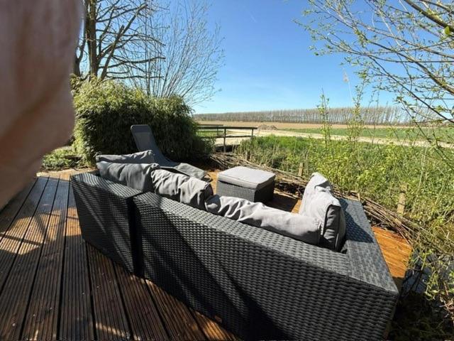 Balkón nebo terasa v ubytování Vrijstaande accommodatie Glamping de Kas InN