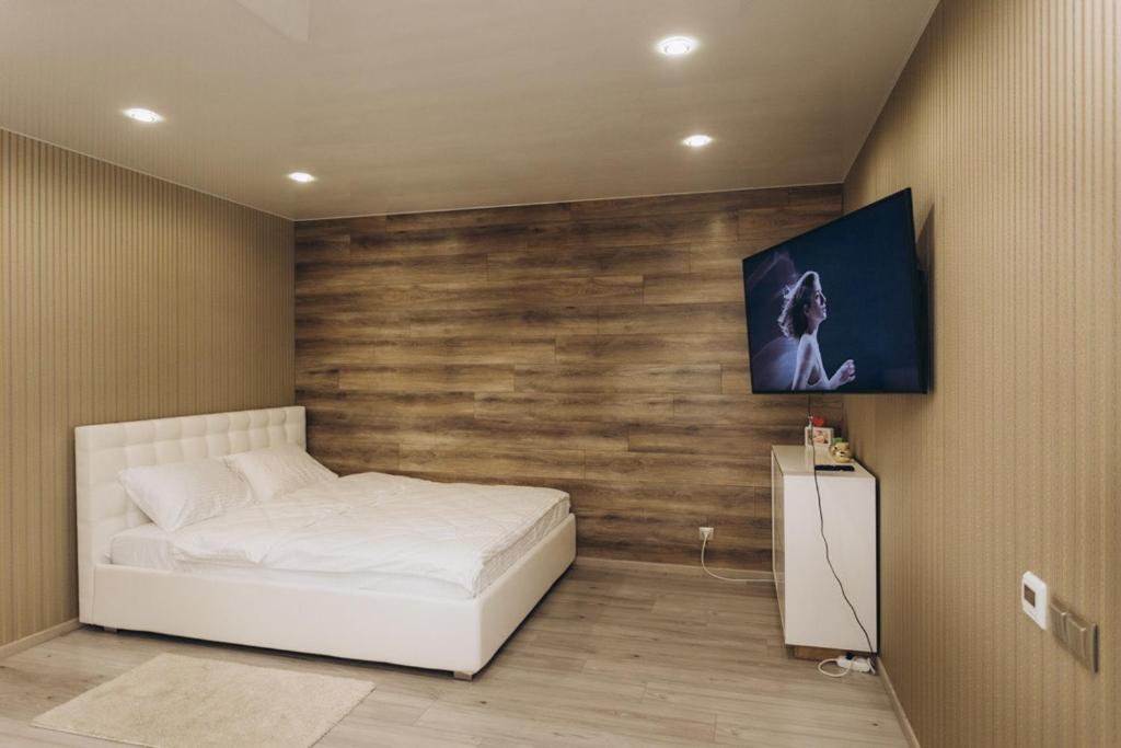 Una cama o camas en una habitación de 14/3 вулиця Прокоф'єва