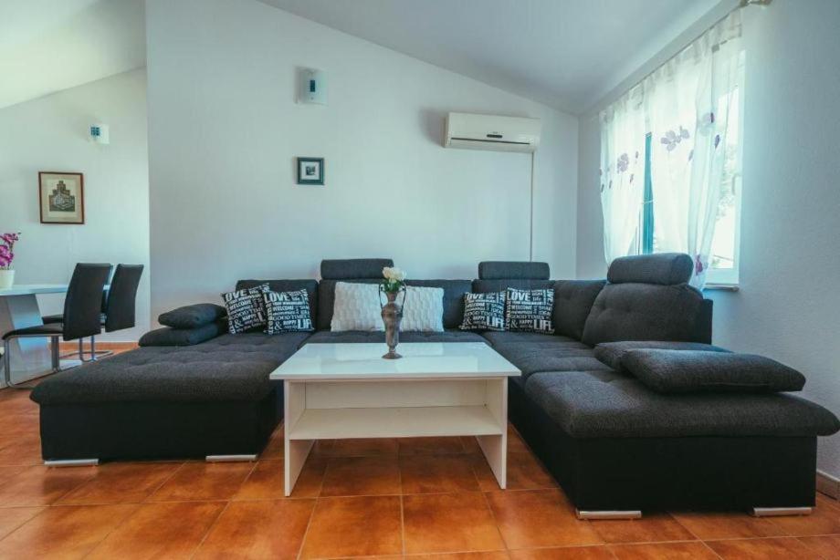 Et opholdsområde på Villa Relax - apartman