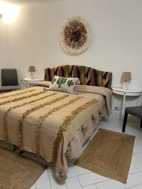 Postel nebo postele na pokoji v ubytování Villa Manni