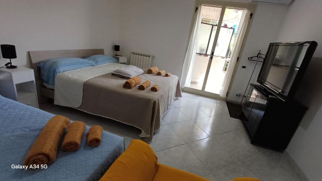 Postel nebo postele na pokoji v ubytování Casa Vacanze AML