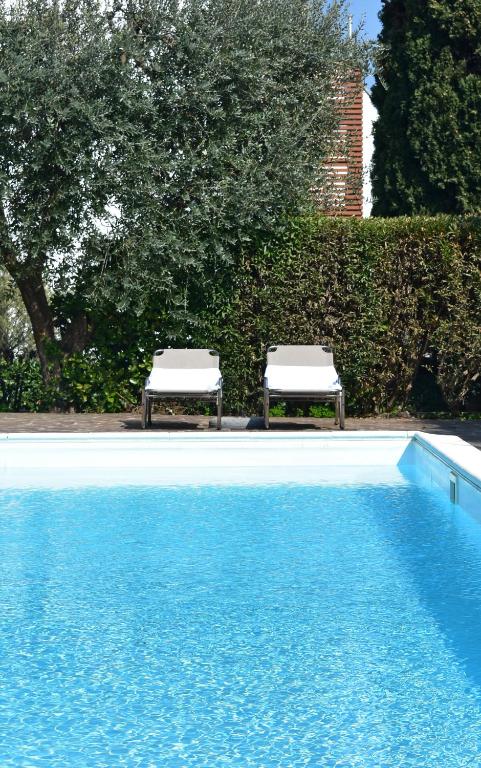Poggio Al Lago Apartments & Rooms