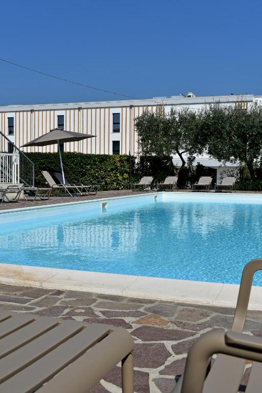 Poggio Al Lago Apartments & Rooms
