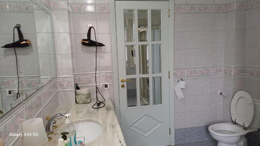 Koupelna v ubytování Casa Vacanze AML