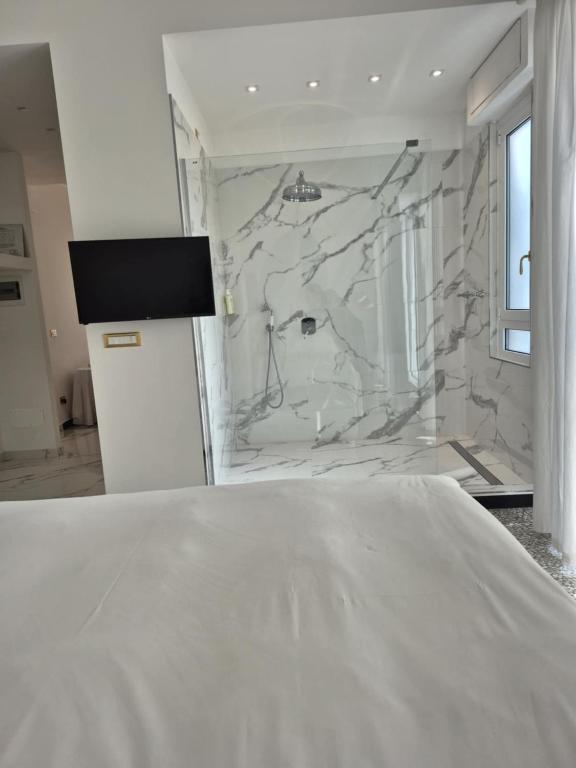 Postel nebo postele na pokoji v ubytování Eveline 2 - Piscina Privata o Jacuzzi