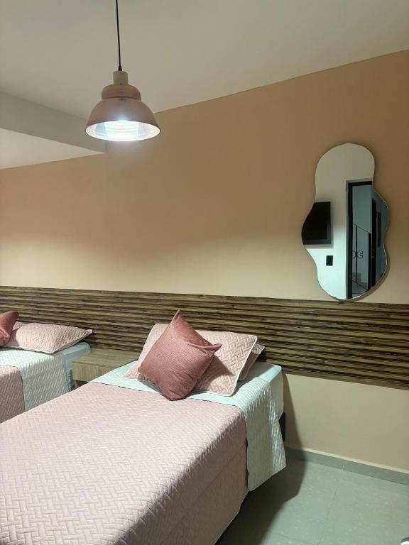 Postel nebo postele na pokoji v ubytování Hotel Lesus