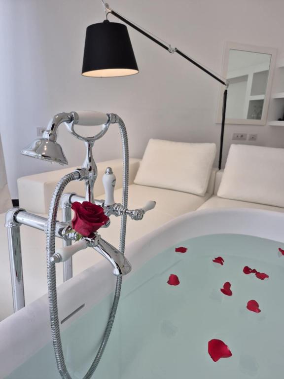 Postel nebo postele na pokoji v ubytování Eveline 2 - Piscina Privata o Jacuzzi