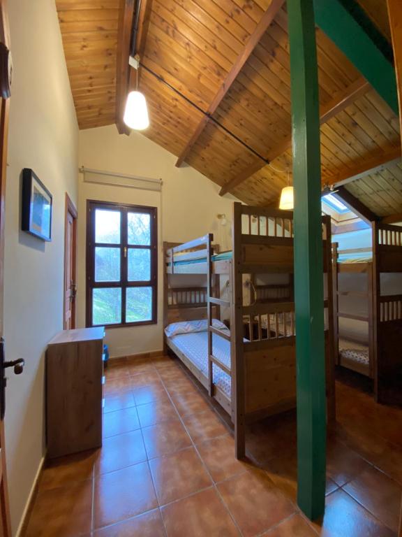Postel nebo postele na pokoji v ubytování Albergue Peña Castil