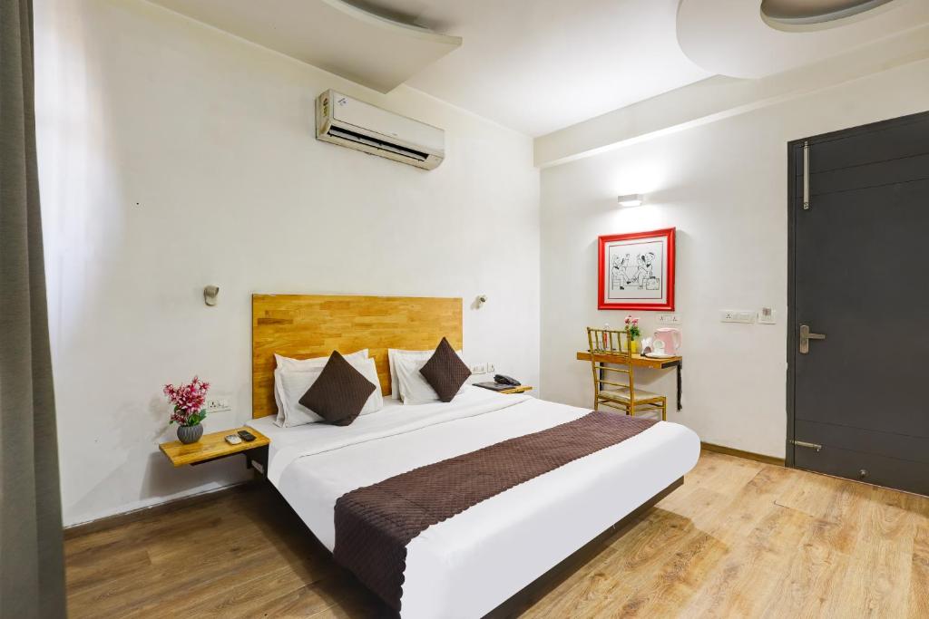 Postel nebo postele na pokoji v ubytování Hotel Wedlock Sector - 47