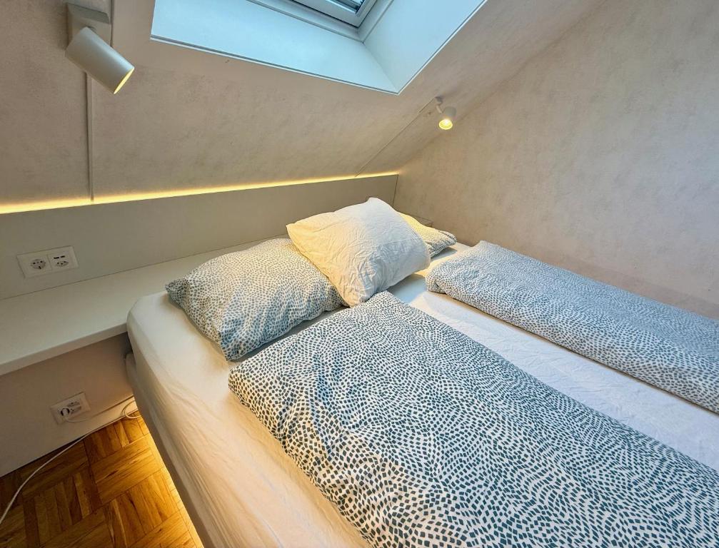 Postel nebo postele na pokoji v ubytování bedinBERN Aparthotel
