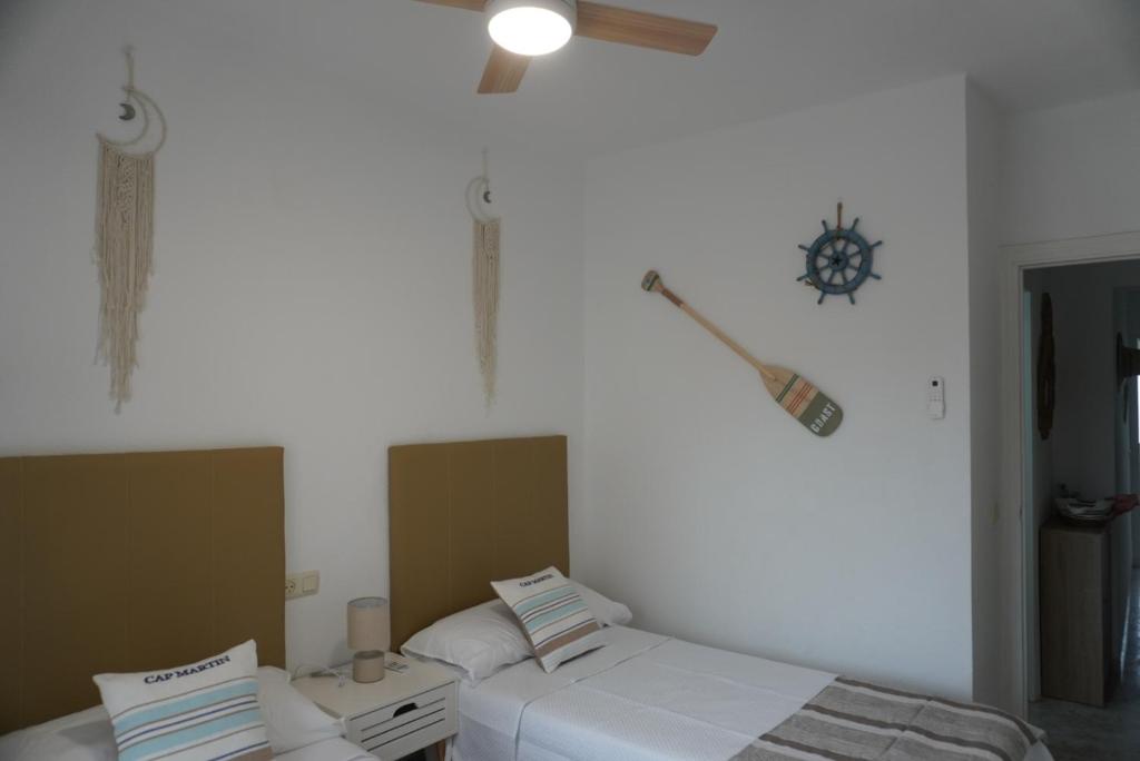 Postel nebo postele na pokoji v ubytování Meleta Apartments