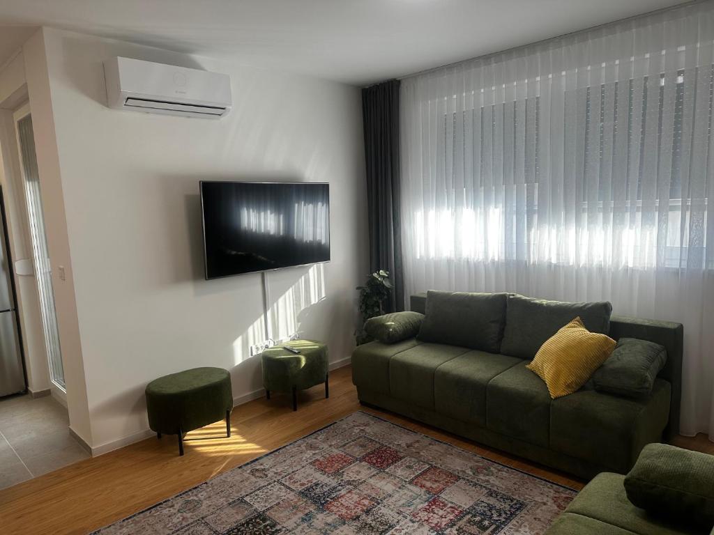 Televisyen dan/atau pusat hiburan di Apartman Marvitus 5 Luxury