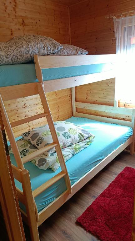 Postel nebo postele na pokoji v ubytování Ośrodek Wypoczynkowy "Słoneczko"