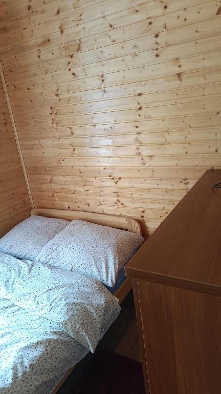 Postel nebo postele na pokoji v ubytování Ośrodek Wypoczynkowy "Słoneczko"