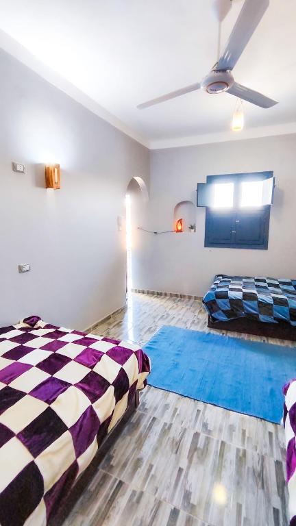Postel nebo postele na pokoji v ubytování Laila's Home