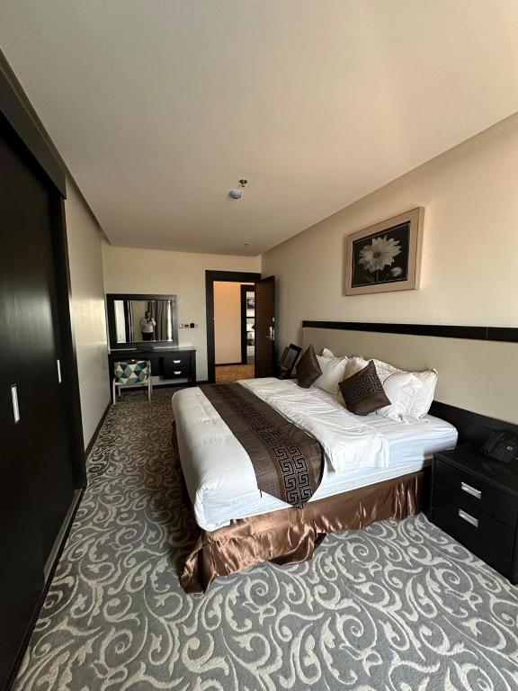Postel nebo postele na pokoji v ubytování MBN ARTAMA Hotel