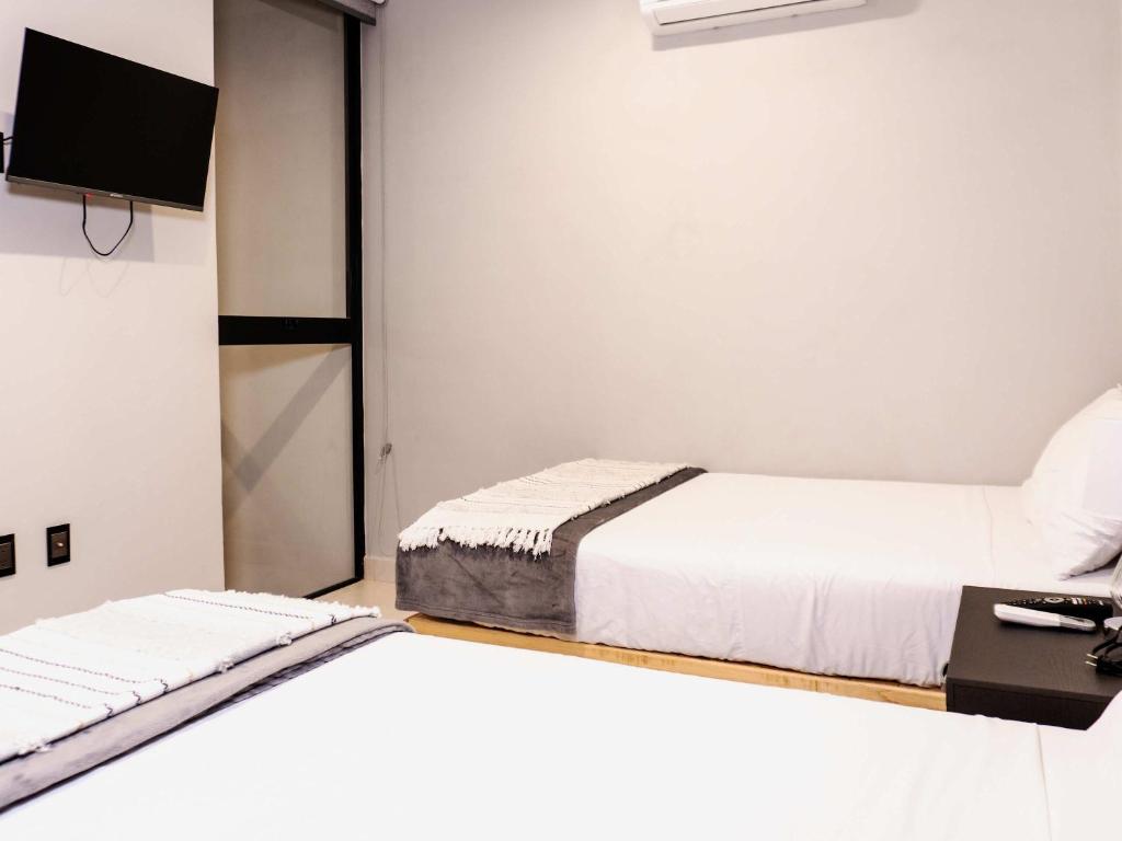 Postel nebo postele na pokoji v ubytování Depa para 6 con alberca en roof - Perlas 9
