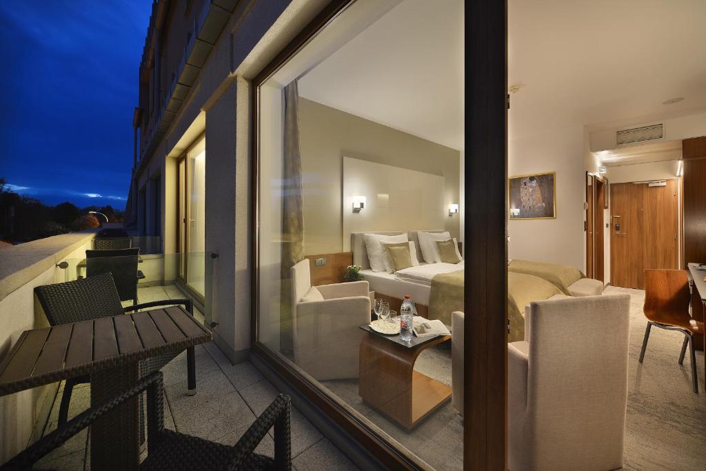 Postel nebo postele na pokoji v ubytování Wellness Hotel Diamant