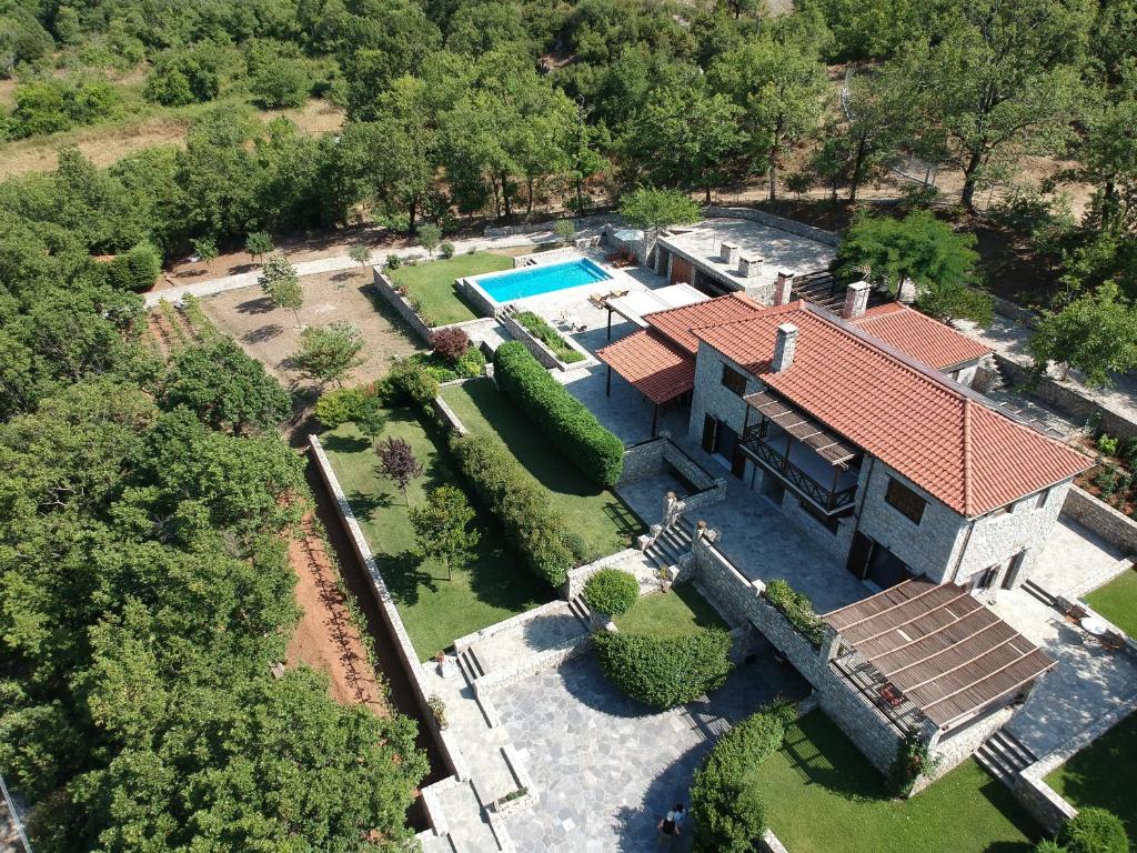 an aerial view of a house with a swimming pool at Tihio Pool Villa & Spa in Tíkhion