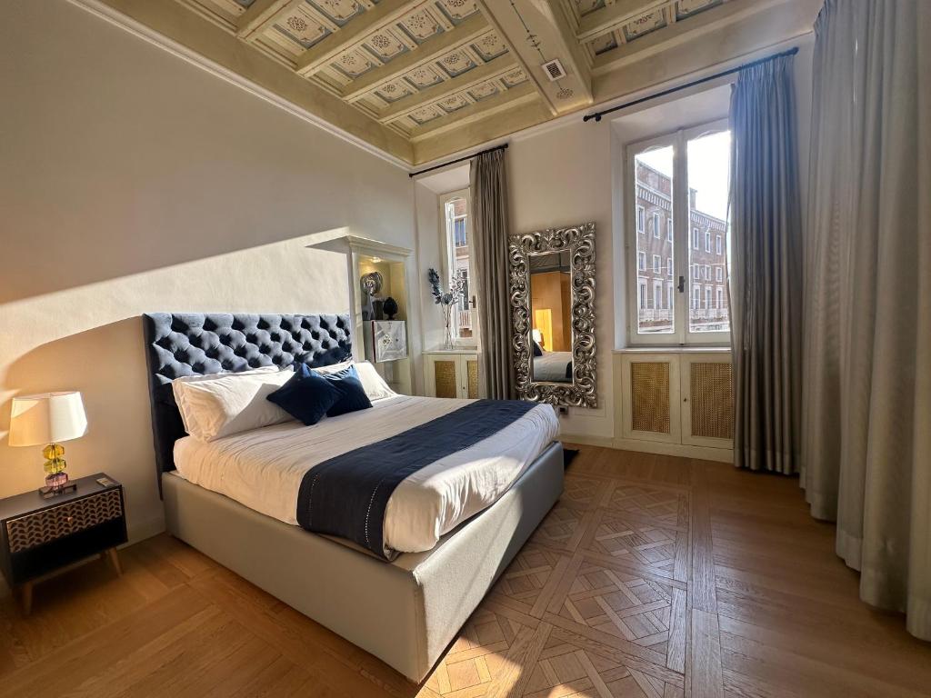 Ένα ή περισσότερα κρεβάτια σε δωμάτιο στο Residenza Nobile Vittoria