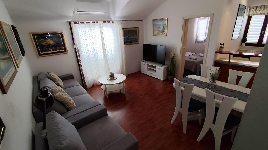 TV a/nebo společenská místnost v ubytování Apartman Beus