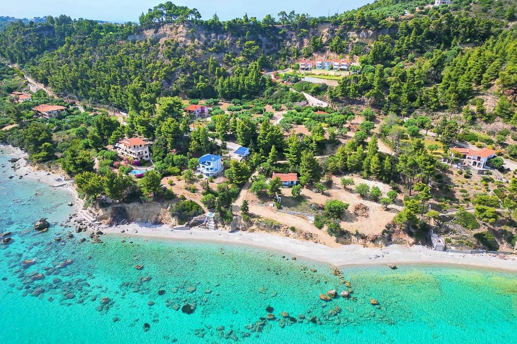 an aerial view of a beach with a resort at Villa Horizontes 1 in Possidi