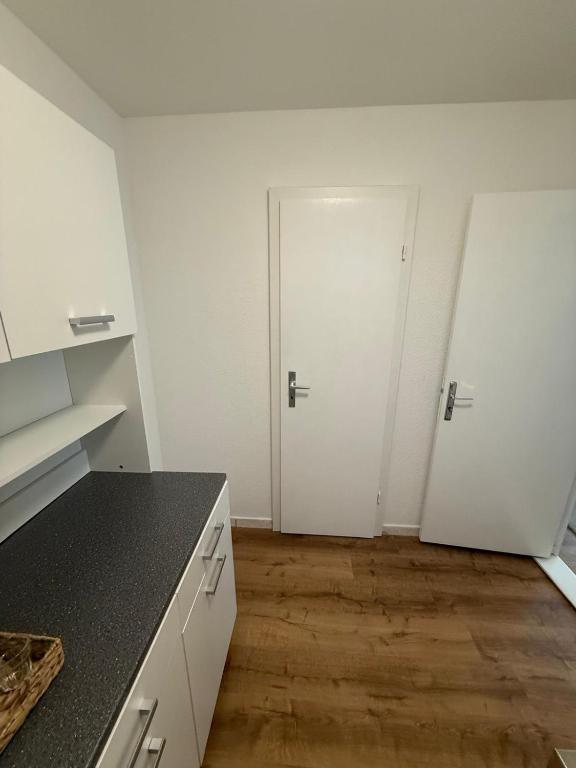 Kuchyň nebo kuchyňský kout v ubytování BLISS Basel Residence