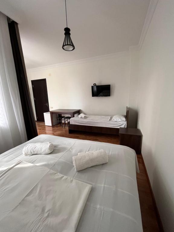 Postel nebo postele na pokoji v ubytování Madona Homestay
