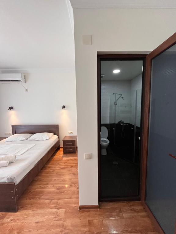 Postel nebo postele na pokoji v ubytování Madona Homestay