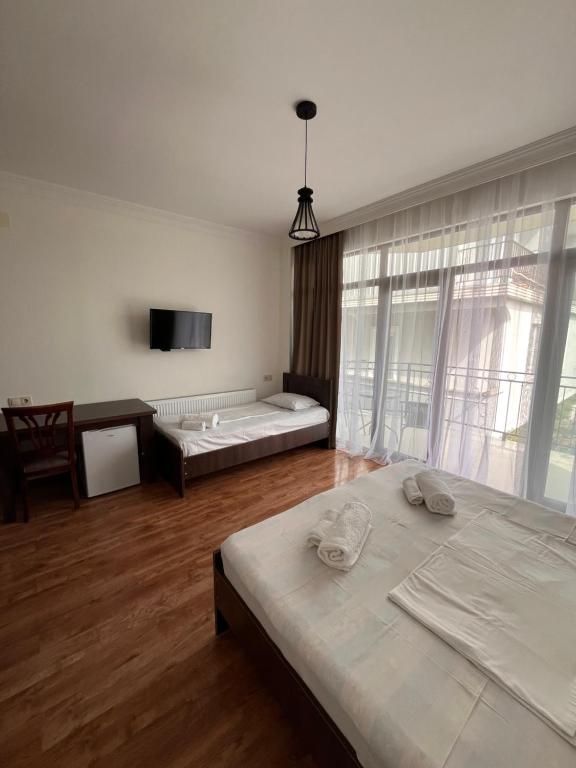 Postel nebo postele na pokoji v ubytování Madona Homestay