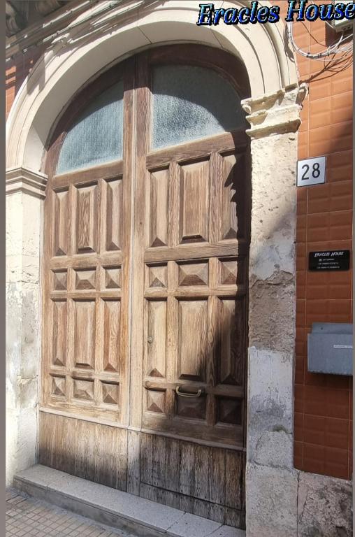 The facade or entrance of Eracles House near Ortigia Island
