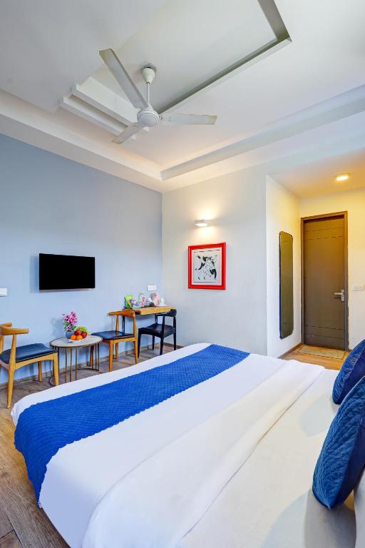 Postel nebo postele na pokoji v ubytování Hotel Wedlock Premium Huda City