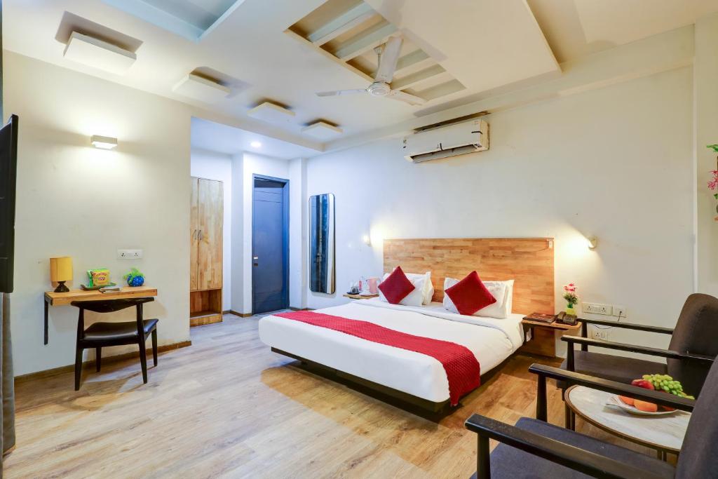 Postel nebo postele na pokoji v ubytování Hotel Wedlock Premium Huda City