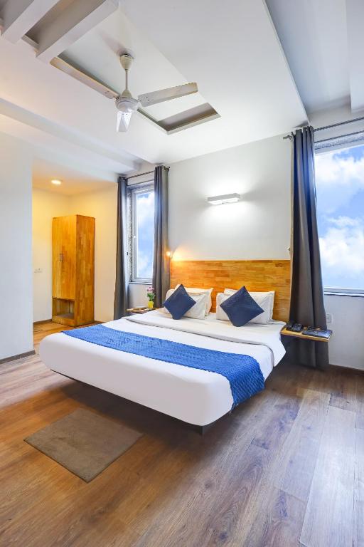 Postel nebo postele na pokoji v ubytování Hotel Wedlock Premium Huda City