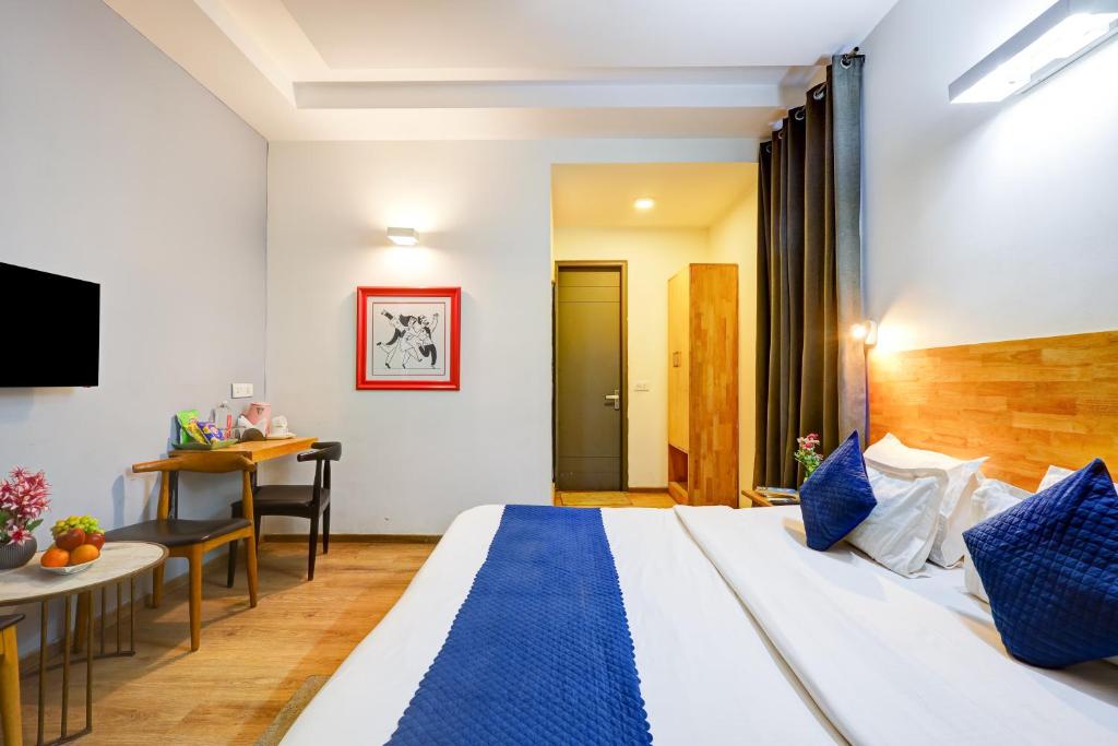 Postel nebo postele na pokoji v ubytování Hotel Wedlock Premium Huda City