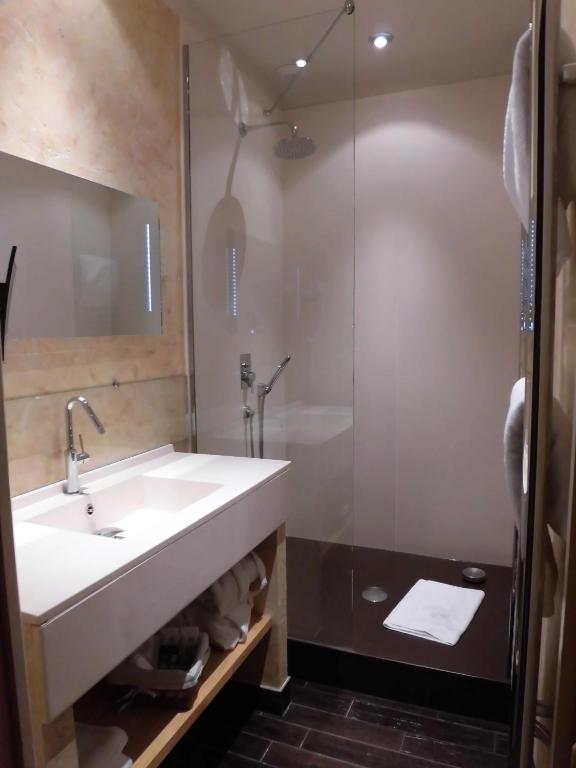 Salle de bains dans l'établissement L'Esplanade