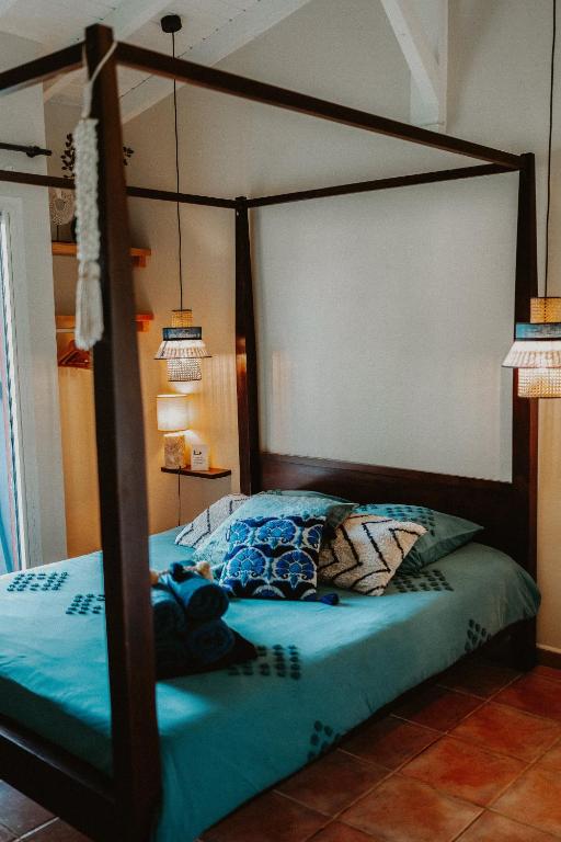 Postel nebo postele na pokoji v ubytování Villa Manika vue mer