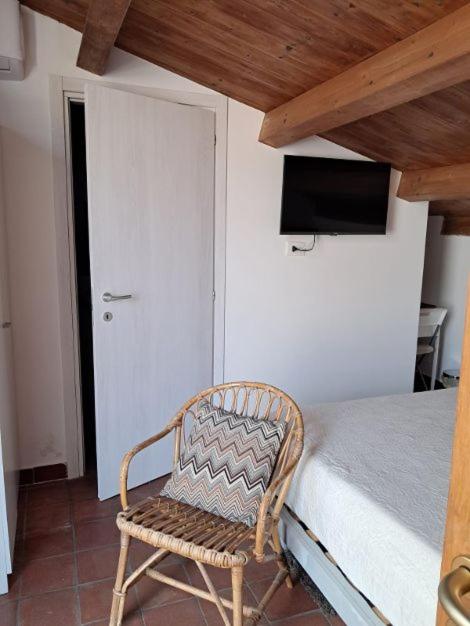 Postel nebo postele na pokoji v ubytování Casa Antioco B&B