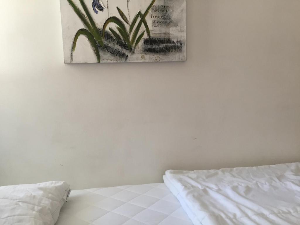 Postel nebo postele na pokoji v ubytování Linné Hostel