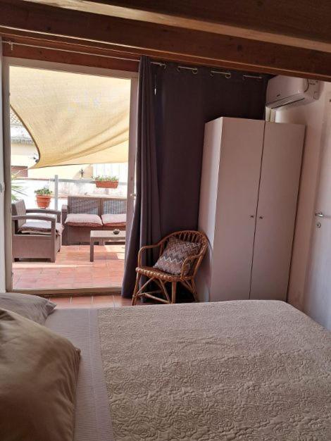 Postel nebo postele na pokoji v ubytování Casa Antioco B&B